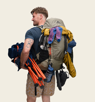 MAN WITH HIKING GEAR